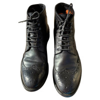 Officine Creative Stiefeletten aus Leder in Schwarz