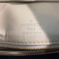 Louis Vuitton Houston Leer in Goud