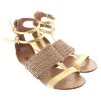 Alaïa Sandals in gold