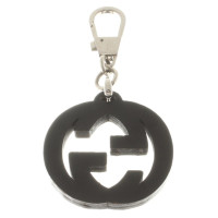 Gucci Logo pendant with rivets