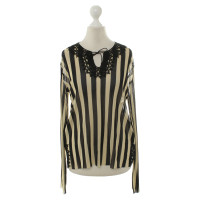 Jean Paul Gaultier top in the transparent look of the Strip