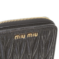 Miu Miu porte-monnaie « Portafoglio Pattina matelassée » en noir