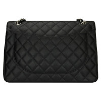 Chanel "Maxi Double Flap Bag"