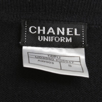 Chanel Cardigan con la patch logo