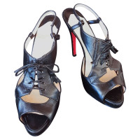 Christian Louboutin Black tasseled lace-up platform sandals