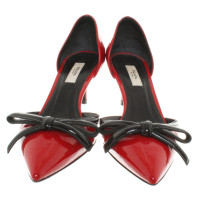 Prada pumps in red