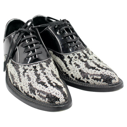 Dolce & Gabbana Chaussures à lacets en Cuir verni en Noir
