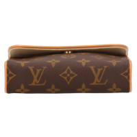 Louis Vuitton Pochette in Brown