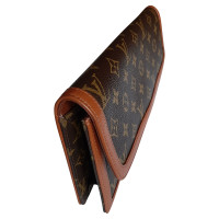 Louis Vuitton Clutch Canvas in Bruin