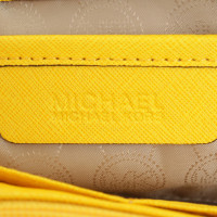 Michael Kors clutch in yellow