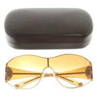 Louis Vuitton Sonnenbrille in Goldfarben