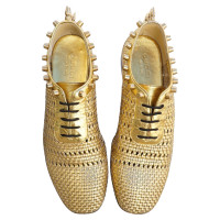 Gucci Gold lace-up laces with studs