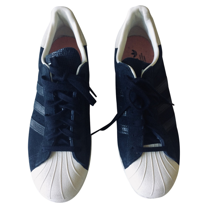 blue leather adidas trainers