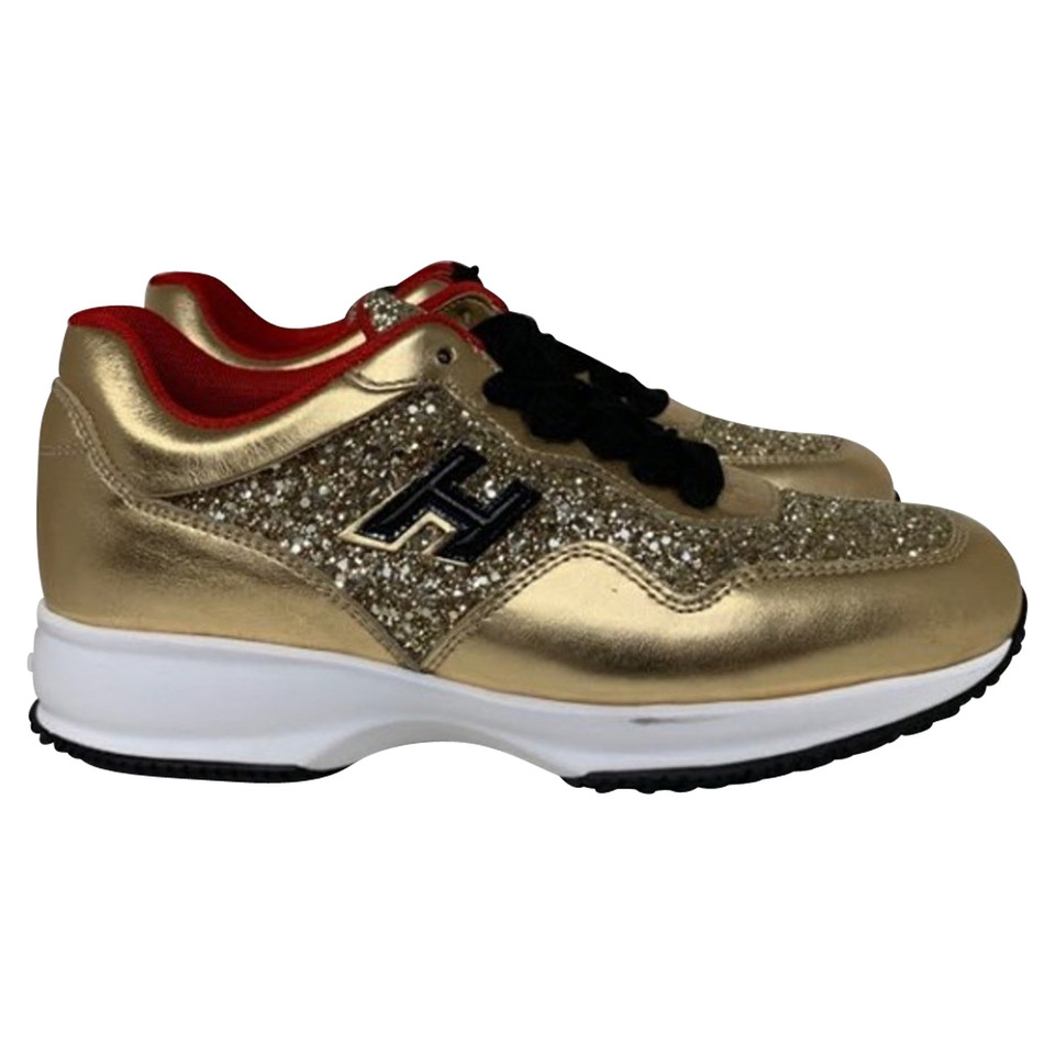 Hogan Sneakers aus Leder in Gold