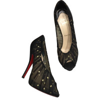 Christian Louboutin Peeptoes op zwart