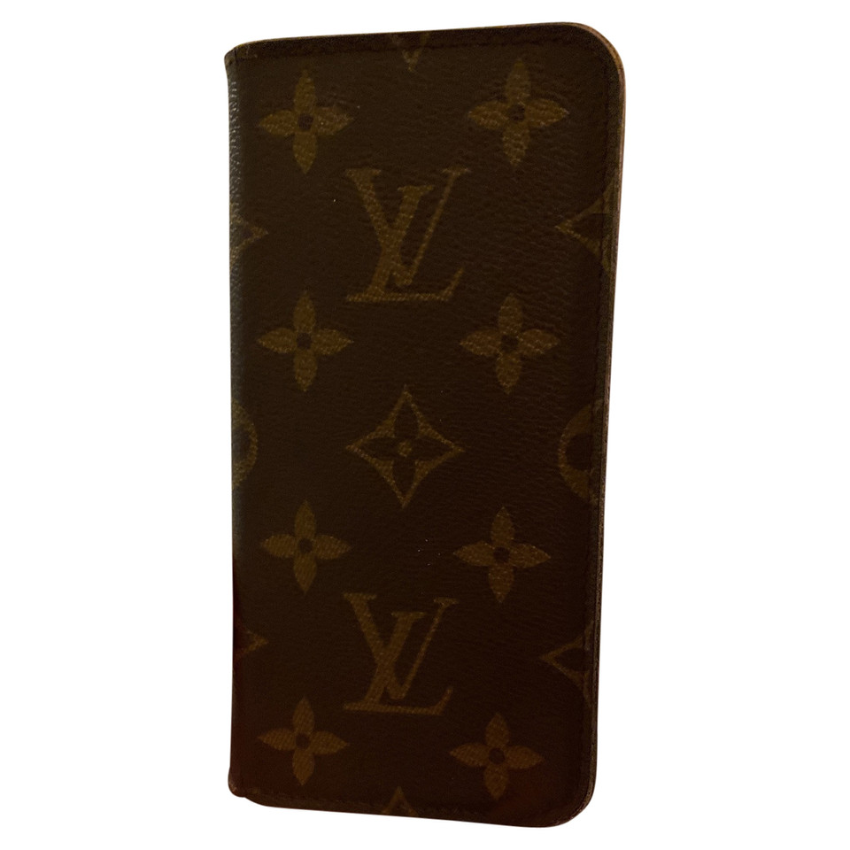 Louis Vuitton Accessoire Leer in Bruin