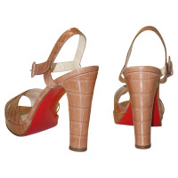 Christian Louboutin Platform Sandals made from crocodile leather