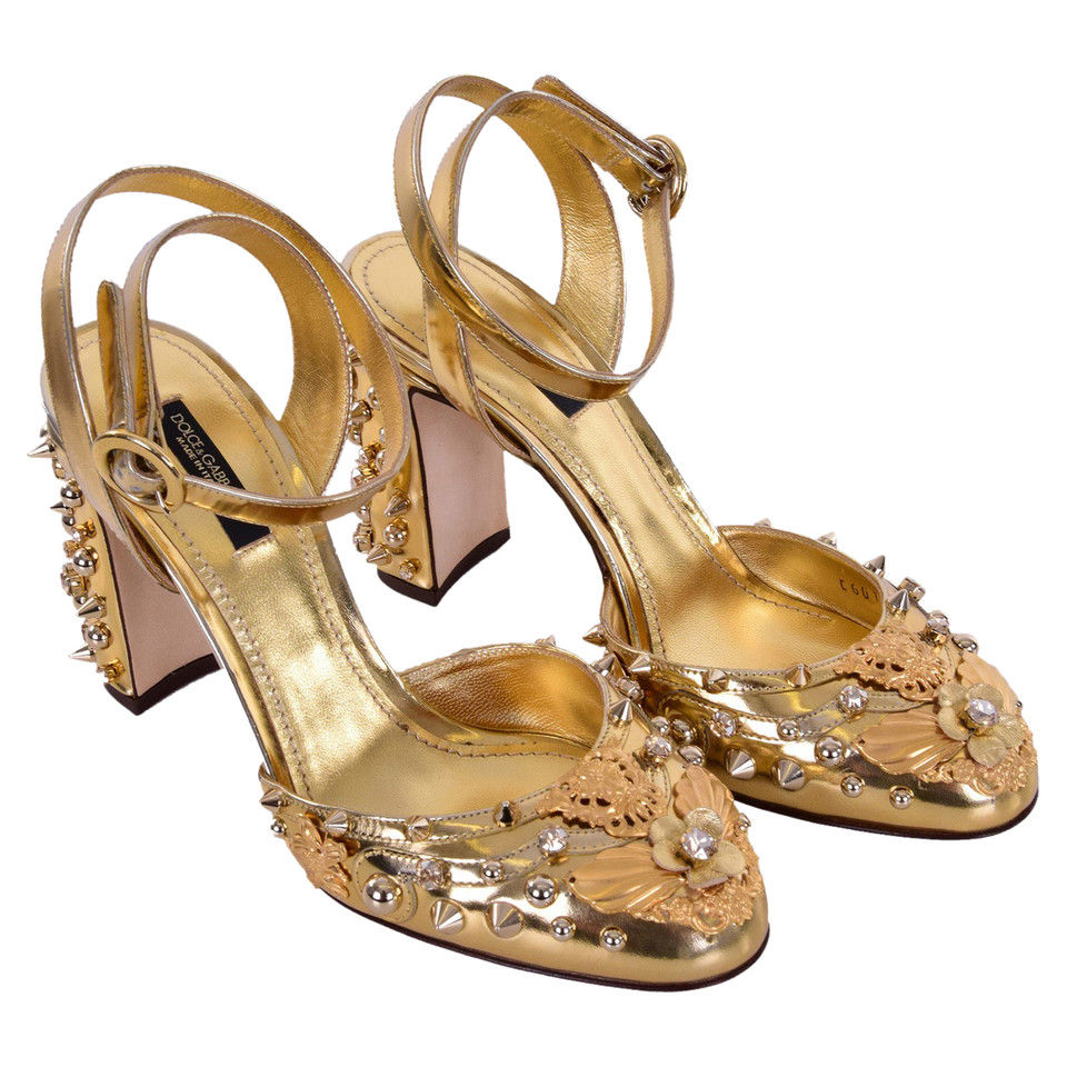 Dolce & Gabbana Pumps/Peeptoes Patent leather in Gold