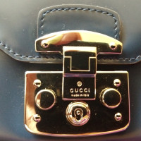 Gucci Sac à main/Portefeuille en Cuir verni en Bleu
