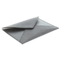 Louis Vuitton clutch in envelopes look