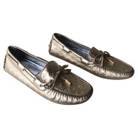 Louis Vuitton Slipper/Ballerinas aus Leder in Gold