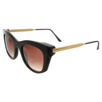 Thierry Lasry Cateye sunglasses in black / gold