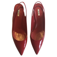 Miu Miu Sandalen aus Lackleder in Rot