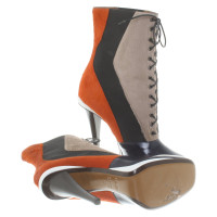 Fendi Bottines avec bordure en fourrure