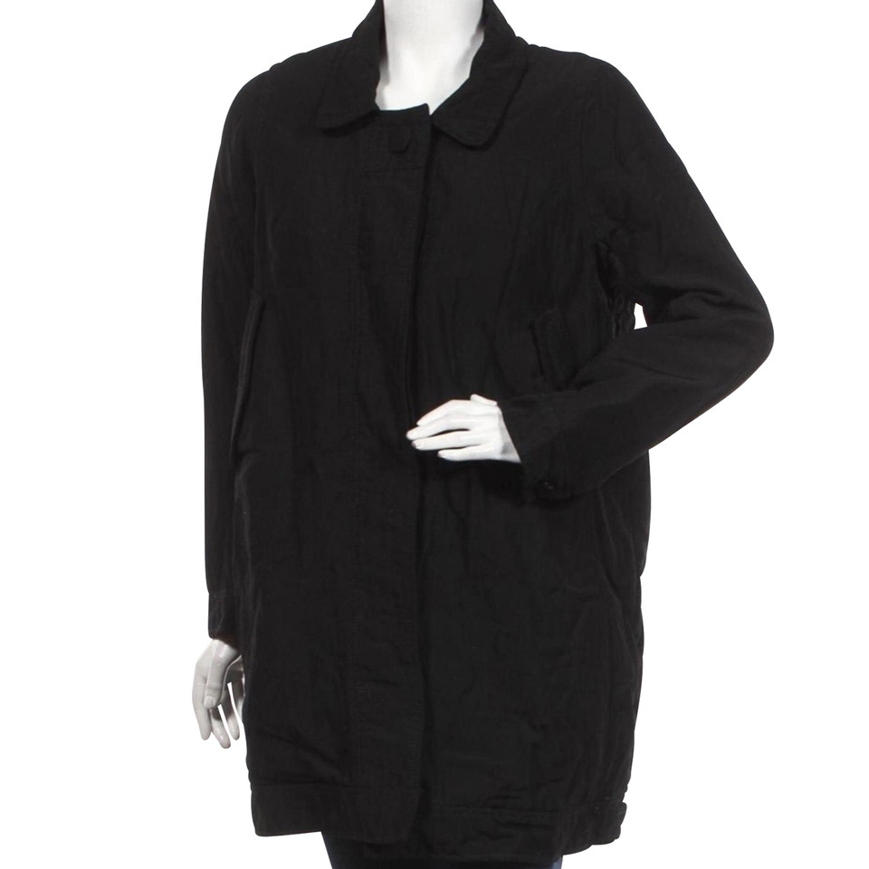 Acne Jacke/Mantel aus Wolle in Schwarz