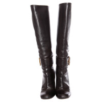 Gucci Black leather boots with gold buckles 