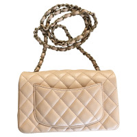 Chanel Classic Flap Bag New Mini Leather in Beige