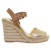 Prada Wedges aus Leder in Gold