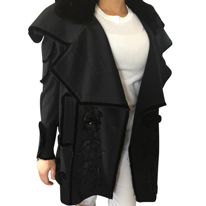 Christian Dior Jacke/Mantel aus Wolle in Schwarz