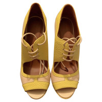 Trussardi Pumps/Peeptoes Leather in Yellow
