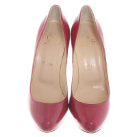 Christian Louboutin pumps in fucsia