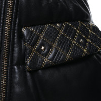 Versace Manteau en cuir avec bordure en fourrure
