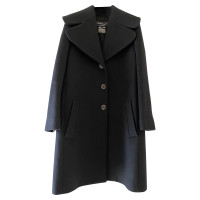 Salvatore Ferragamo Jacke/Mantel aus Wolle in Schwarz