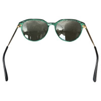 Yves Saint Laurent Sunglasses with green frame