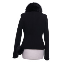 Hussein Chalayan Coat with faux fur trim