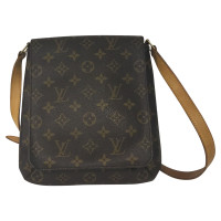 Louis Vuitton Muse Canvas in Brown