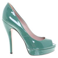 Gucci Pumps/Peeptoes Patent leather in Green