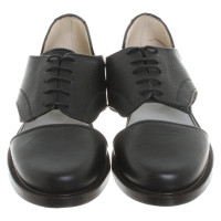 Minimarket Schnürschuhe aus Leder in Schwarz