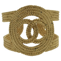 Chanel Gold-colored bangle with logo