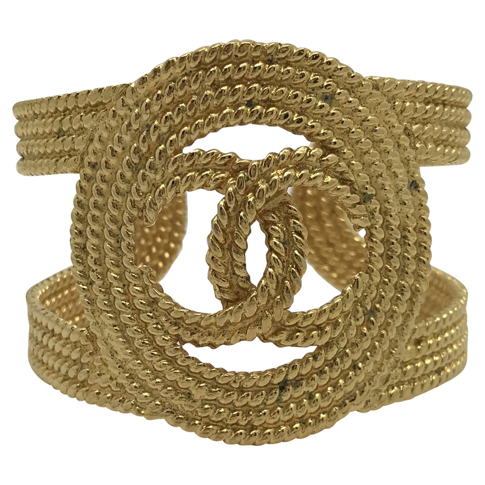Chanel Gold-colored bangle with logo