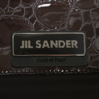 Jil Sander clutch avec gaufrage reptile