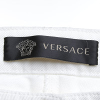 Gianni Versace Pantalon blanc avec rivets