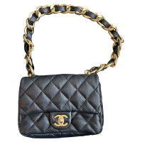 Chanel Flap Bag Mini aus Leder in Schwarz