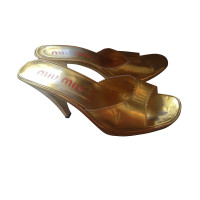 Miu Miu Goldfarbene Peeptoes