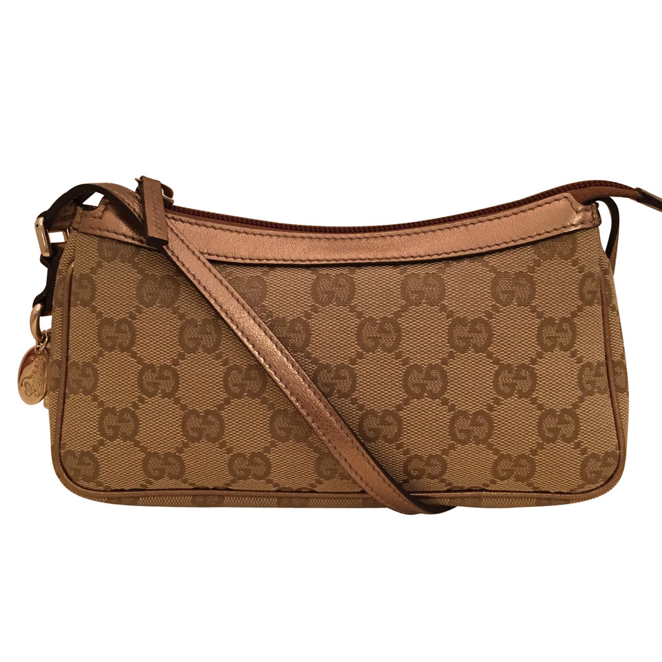 Gucci Clutch aus Canvas in Beige