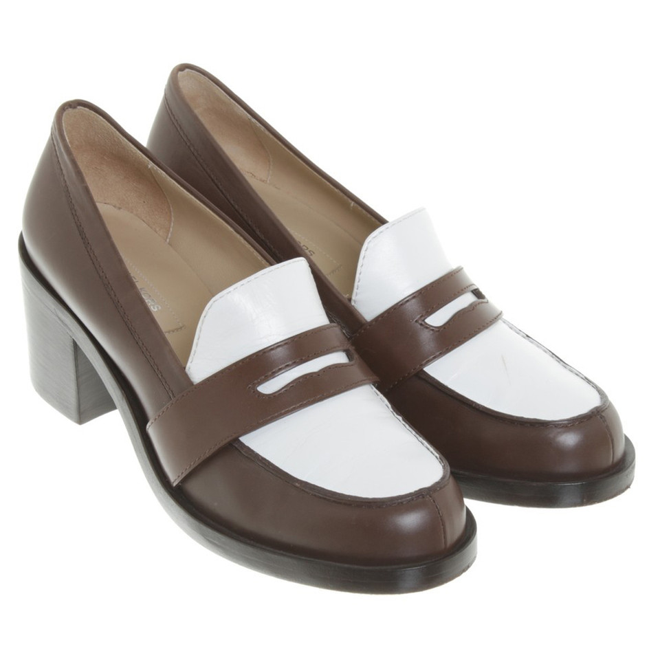 Michael Kors pumps in brown and white